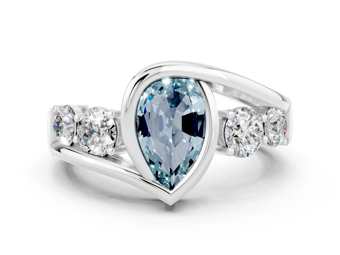 White gold Bezel Set Pear Cut Diamond Split Shank Ring