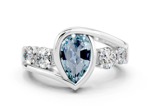 White gold Bezel Set Pear Cut Diamond Split Shank Ring