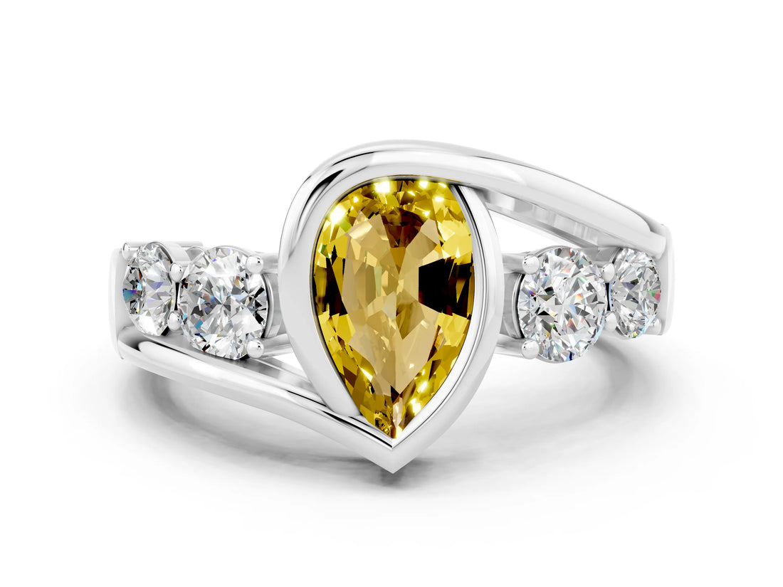 White gold Bezel Set Pear Cut Diamond Split Shank Ring