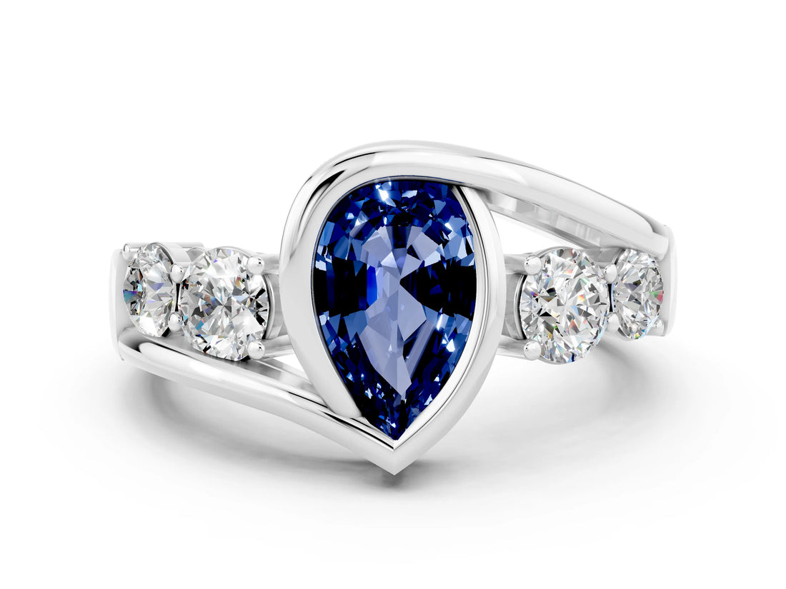 White gold Bezel Set Pear Cut Diamond Split Shank Ring