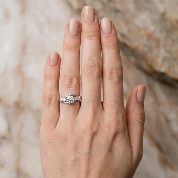 White gold Bezel Set Round Diamond Split Shank Ring