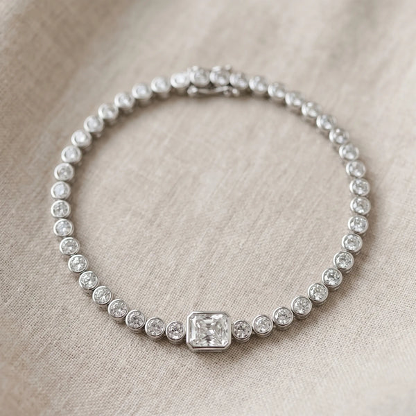 White gold Bezel-Set Round Diamond Tennis Bracelet with Radiant Center Diamond
