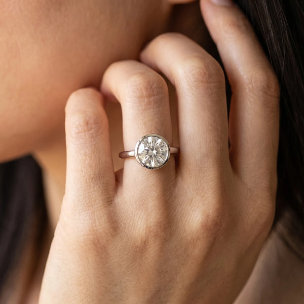 White gold Bezel Set Round Solitaire Engagement Ring with Classic Band
