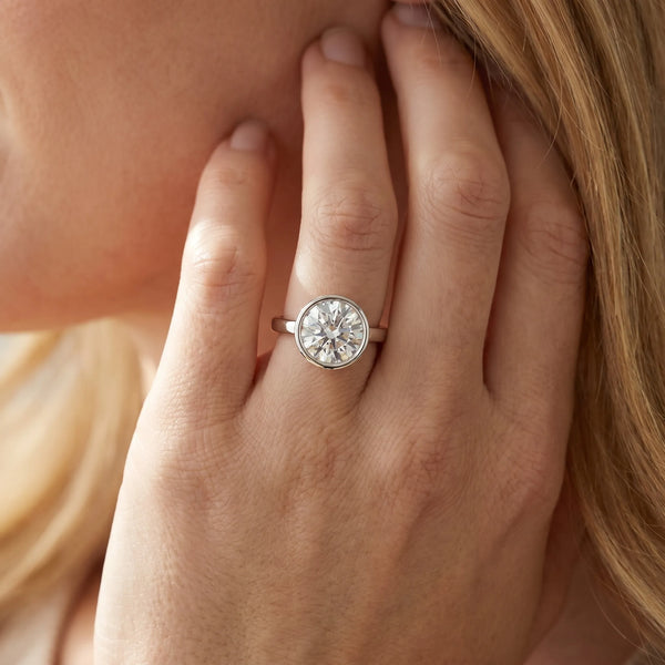 White gold Bezel Set Round Solitaire Ring with Plain Band