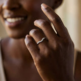 White gold Curved Diamond Wedding Band with Round Cut Stones and Shared Prong Setting_26