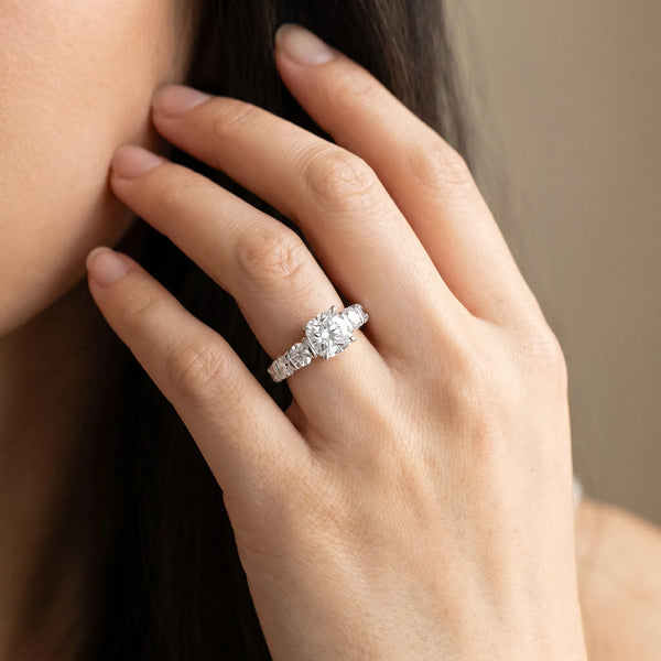 White gold Cushion Brilliant Trilogy Channel Set Diamond Ring with Bar Prongs