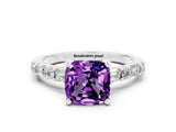 White gold Cushion Cut Amethyst Solitaire with Side Baguettes and Channel Set Band