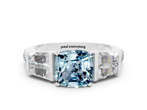 Platinum Cushion Cut Aquamarine Engagement Ring with Baguette Side Stones and Channel Set Band
