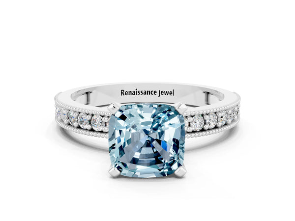 Platinum Cushion Cut Aquamarine Milgrain Pavé Engagement Ring with Four-Prong Setting
