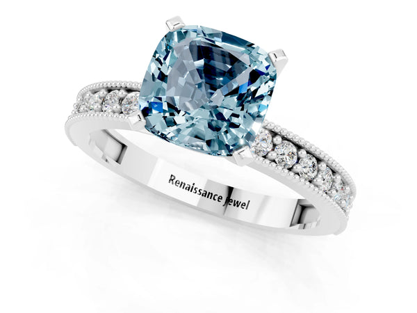 Platinum Cushion Cut Aquamarine Milgrain Pavé Engagement Ring with Four-Prong Setting