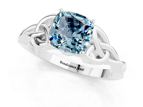 Platinum Cushion Cut Aquamarine Solitaire Engagement Ring with Celtic Knot Band and Four-Prong Setting