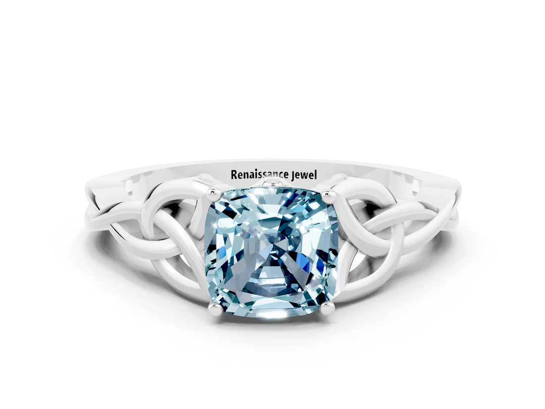 White gold Cushion Cut Aquamarine Solitaire Engagement Ring with Celtic Knot Band and Four-Prong Setting
