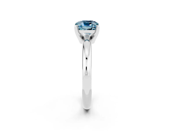 Platinum Cushion Cut Aquamarine Solitaire Engagement Ring with Round Band and Four-Prong Setting
