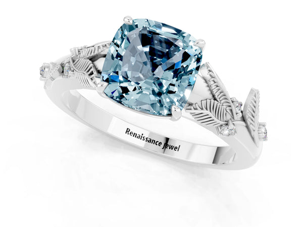 Platinum Cushion Cut Aquamarine Solitaire Ring with Leaf Motif Band and Four-Prong Setting
