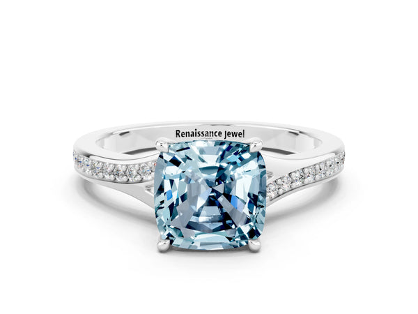 Platinum Cushion Cut Aquamarine Solitaire Ring with Pavé Band and Prong Setting