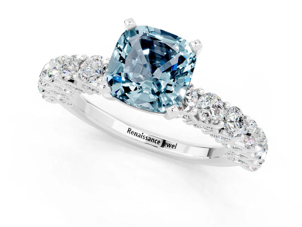 Platinum Cushion Cut Aquamarine Solitaire Ring with Shared Prong Pavé Band and Four-Prong Setting