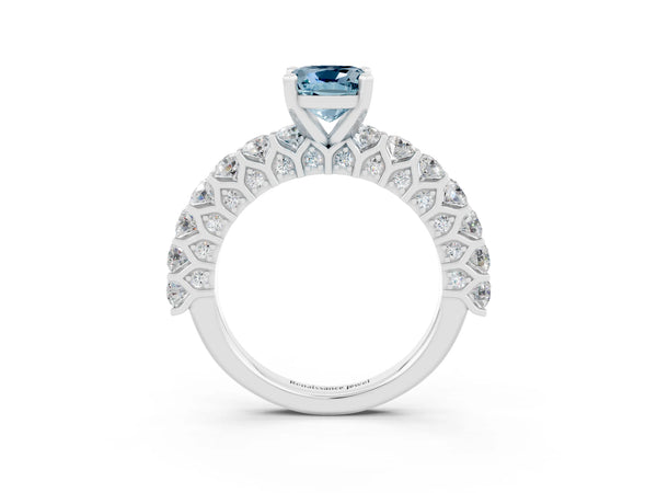 Platinum Cushion Cut Aquamarine Solitaire Ring with Shared Prong Pavé Band and Four-Prong Setting