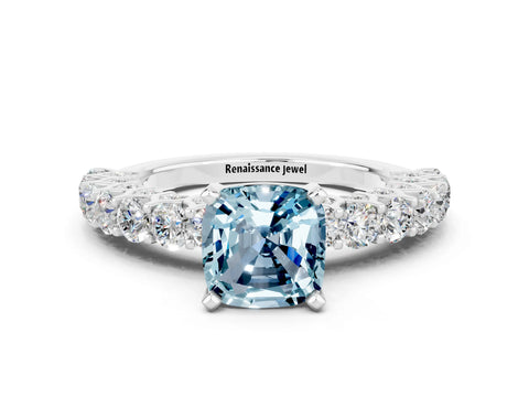 White gold Cushion Cut Aquamarine Solitaire Ring with Shared Prong Pavé Band and Four-Prong Setting