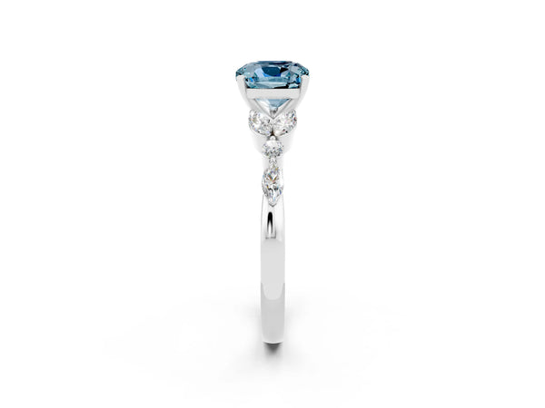 Silver Cushion Cut Aquamarine Solitaire Ring with Side Stones and Four-Prong Setting