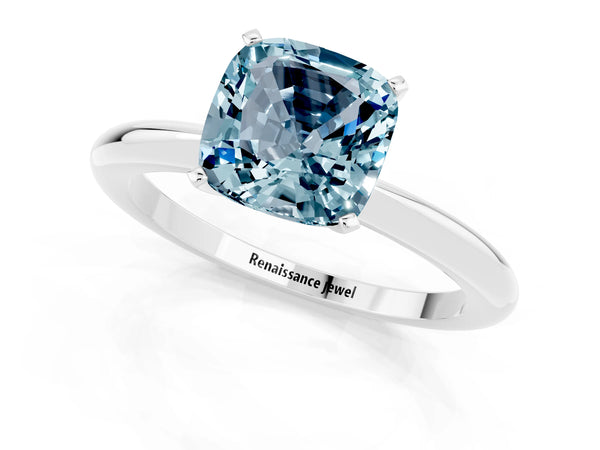Platinum Cushion Cut Aquamarine Solitaire Ring with Six-Prong Setting and Classic Band