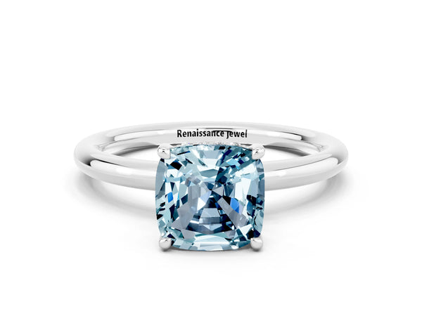 Silver Cushion Cut Aquamarine Solitaire Ring with Thin Band and Four-Prong Setting