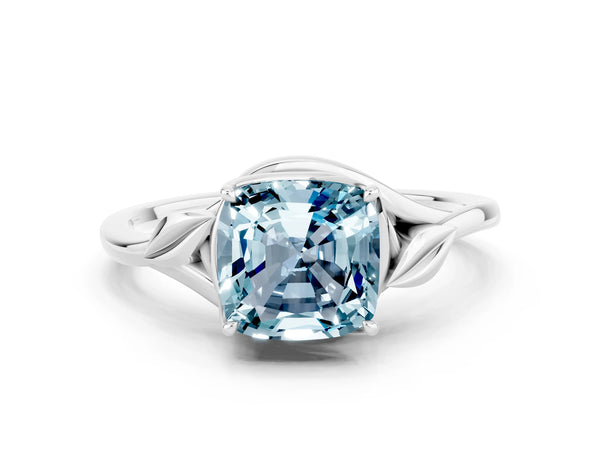 Platinum Cushion Cut Aquamarine Solitaire Ring with Twist Band and Four-Prong Setting