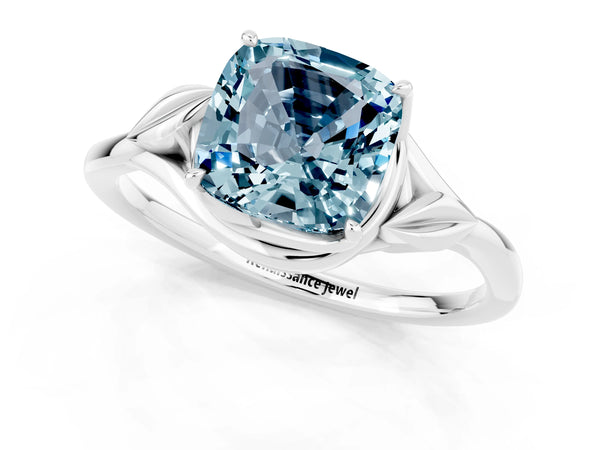 Silver Cushion Cut Aquamarine Solitaire Ring with Twist Band and Four-Prong Setting