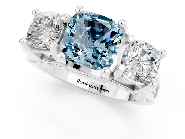Silver Cushion Cut Aquamarine Three-Stone Ring with Channel Set Band and Four-Prong Setting