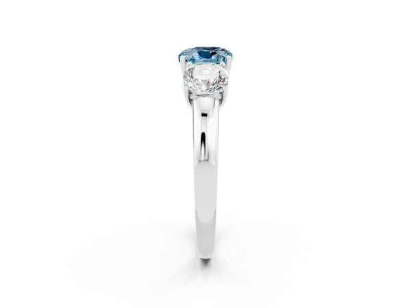 Platinum Cushion Cut Aquamarine Three-Stone Ring with Four-Prong Setting and Classic Band