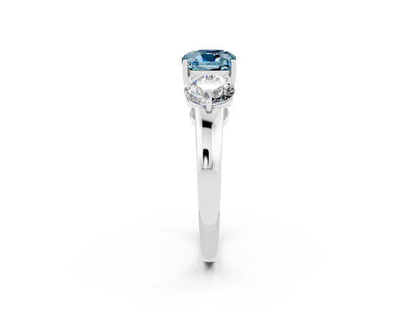 Platinum Cushion Cut Aquamarine Three-Stone Ring with Prong Setting and Classic Band