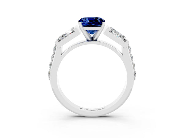 White gold Cushion Cut Blue Sapphire Engagement Ring with Baguette Side Stones and Channel Set Band