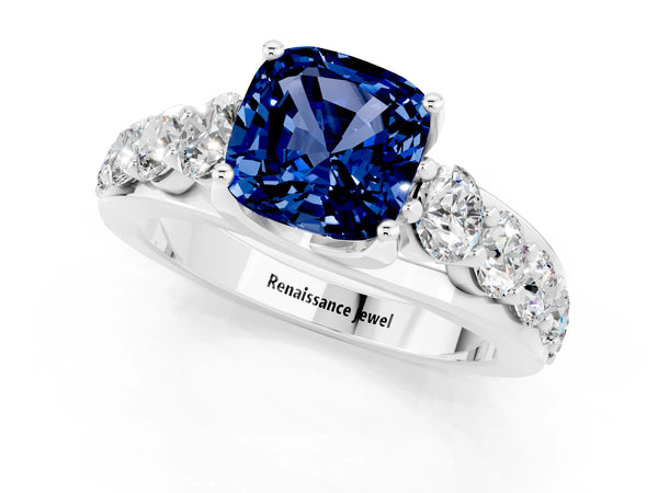 White gold Cushion Cut Blue Sapphire Engagement Ring with Pavé Band and Four-Prong Setting