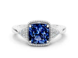 White gold Cushion Cut Blue Sapphire Halo Ring with Tapered Band and Four-Prong Setting