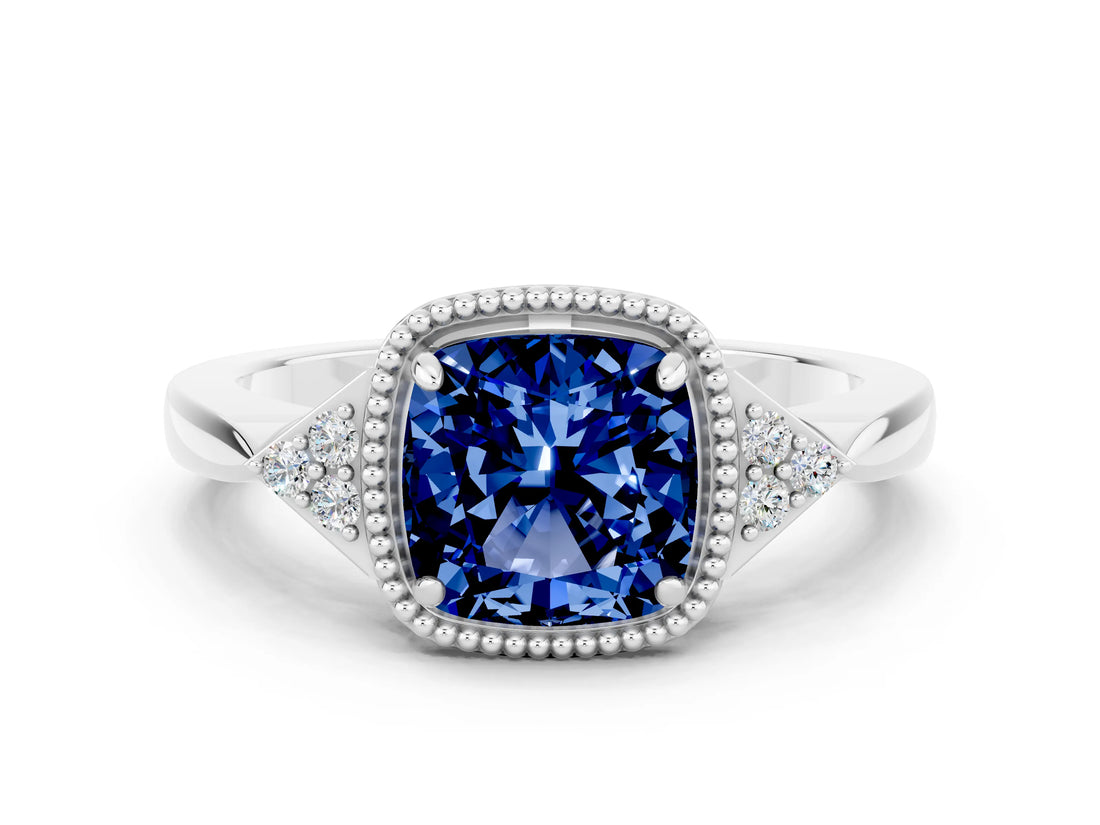 White gold Cushion Cut Blue Sapphire Halo Ring with Tapered Band and Four-Prong Setting