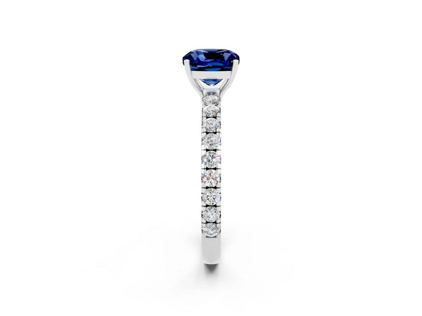Platinum Cushion Cut Blue Sapphire Pavé Solitaire Engagement Ring with Four-Prong Setting