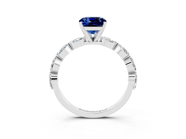 Platinum Cushion Cut Blue Sapphire Ring with Marquise Side Stones and Prong Setting