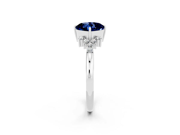 Silver Cushion Cut Blue Sapphire Ring with Side Stones and Four-Prong Setting
