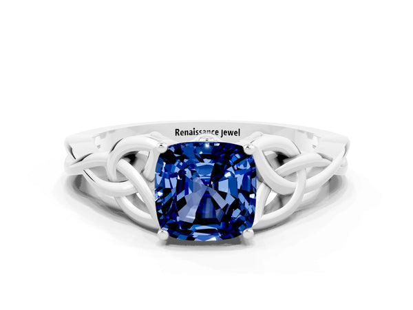 Silver Cushion Cut Blue Sapphire Solitaire Celtic Knot Ring with Four-Prong Setting