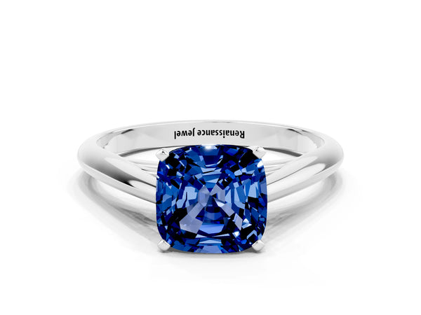 Silver Cushion Cut Blue Sapphire Solitaire Engagement Ring with Cathedral Setting and Four-Prong Mount