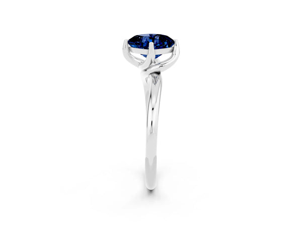 Platinum Cushion Cut Blue Sapphire Solitaire Engagement Ring with Four-Prong Setting and Classic Band
