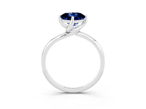 Platinum Cushion Cut Blue Sapphire Solitaire Engagement Ring with Four-Prong Setting and Classic Band