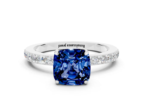 White gold Cushion Cut Blue Sapphire Solitaire Engagement Ring with Pavé Band and Four-Prong Setting