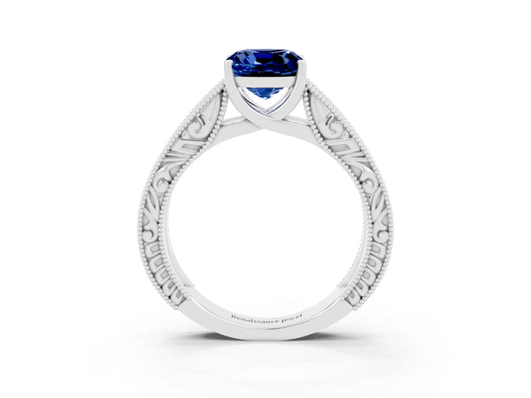 Silver Cushion Cut Blue Sapphire Solitaire Ring with Engraved Band and Four-Prong Setting