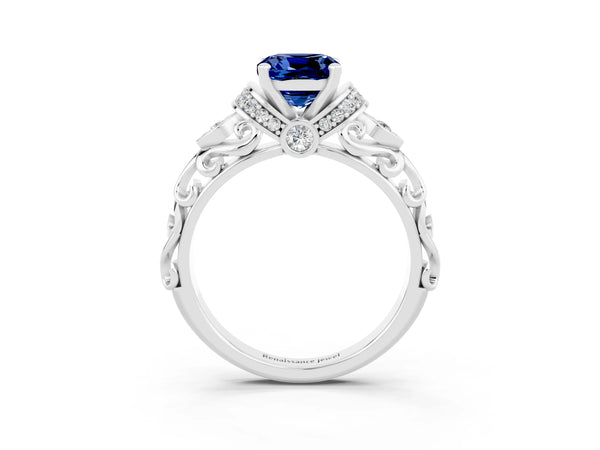 Platinum Cushion Cut Blue Sapphire Solitaire Ring with Filigree Band and Four-Prong Setting