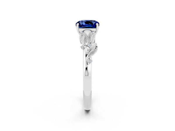 Silver Cushion Cut Blue Sapphire Solitaire Ring with Leaf Motif Band and Four-Prong Setting