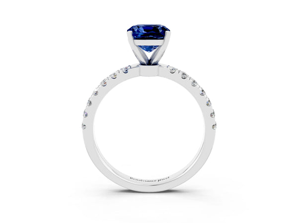 Platinum Cushion Cut Blue Sapphire Solitaire Ring with Pavé Accents and Four-Prong Setting