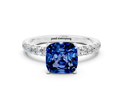 White gold Cushion Cut Blue Sapphire Solitaire Ring with Pavé Accents and Four-Prong Setting