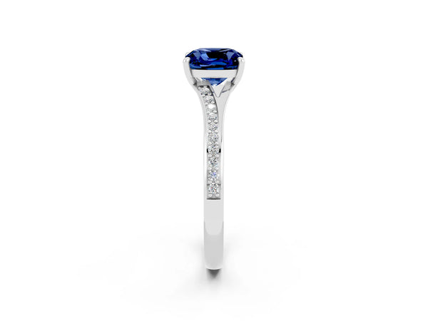 Platinum Cushion Cut Blue Sapphire Solitaire Ring with Pavé Band and Prong Setting