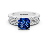 White gold Cushion Cut Blue Sapphire Solitaire Ring with Pavé and Channel Set Band