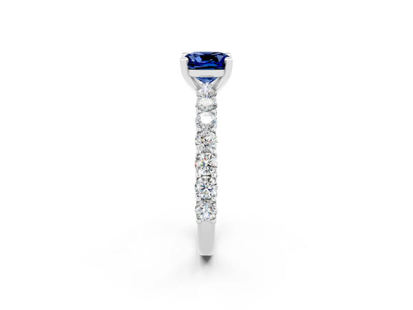 Silver Cushion Cut Blue Sapphire Solitaire Ring with Shared Prong Pavé Band and Four-Prong Setting